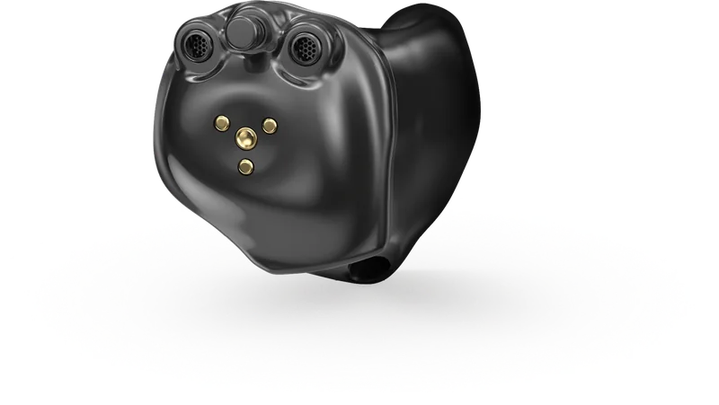 A Starkey Edge AI in the canal hearing aid in black: a custom moulded shell that sits in the outer part of the ear canal